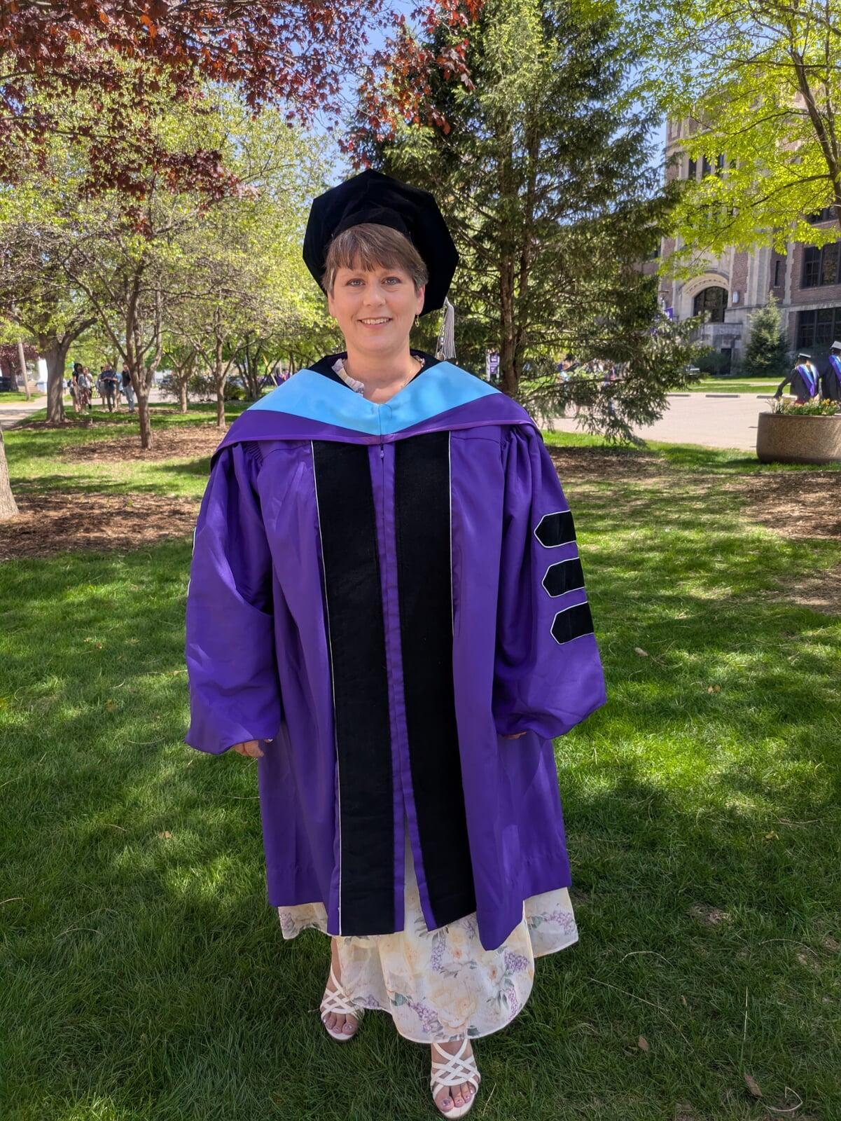 Sadie Gunnink in her doctorate graduation regalia